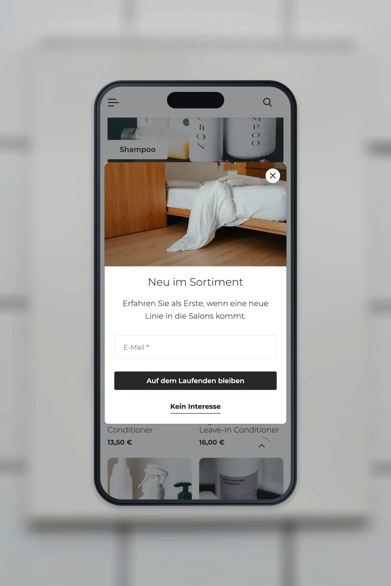 Projekt für einen Onlineshop für Haarpflegeprodukte, die Startseite weiter unten auf einem iPhone