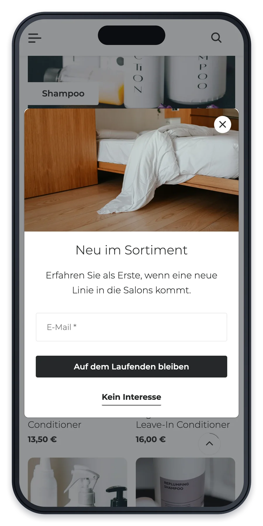 Projekt für einen Onlineshop für Haarpflegeprodukte, die Startseite weiter unten auf einem iPhone