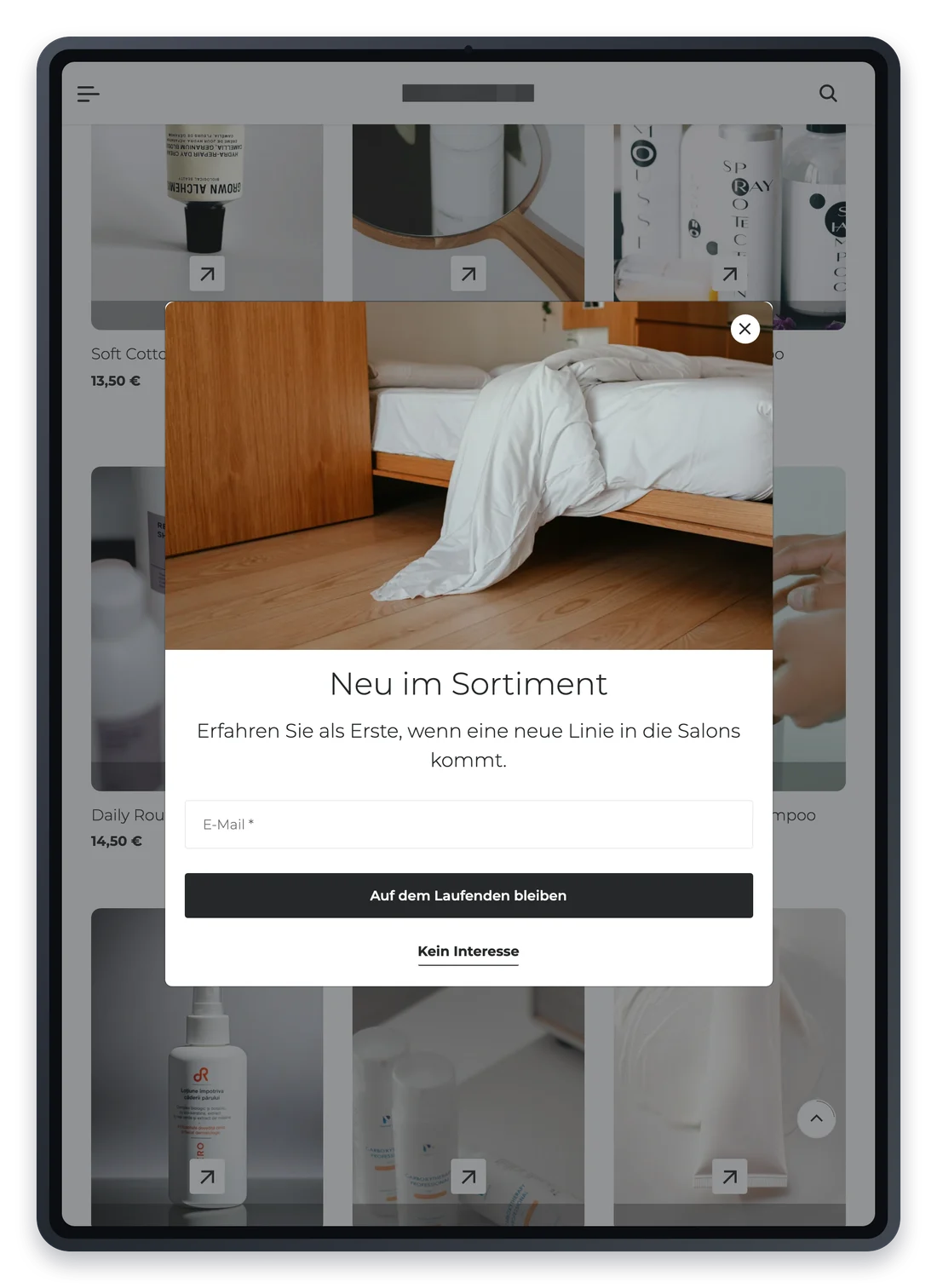 Projekt für einen Onlineshop für Haarpflegeprodukte, die Startseite weiter unten auf einem iPad